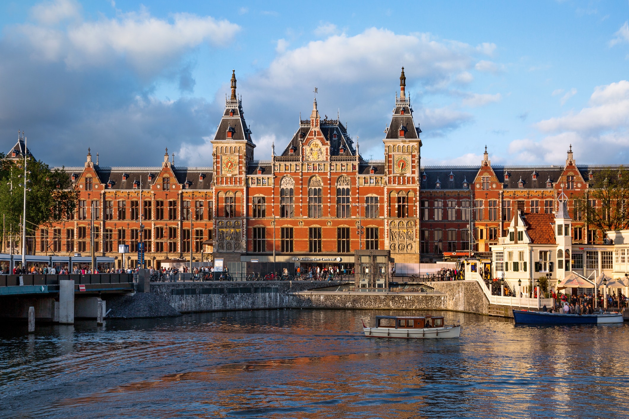 The view across the canal of Amsterdam Centraal train station.