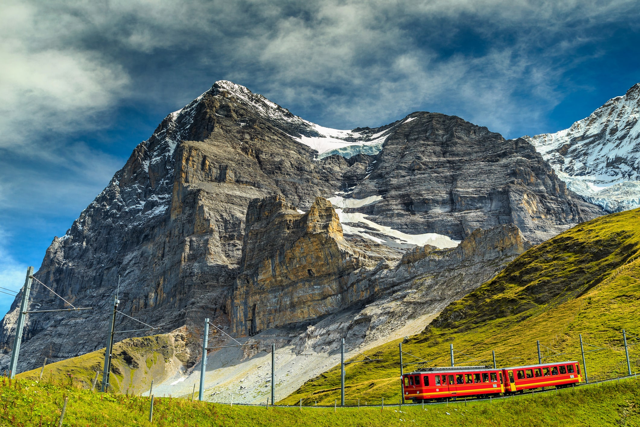 View from below of the mountainside Eigerwand train station in Switzerland.