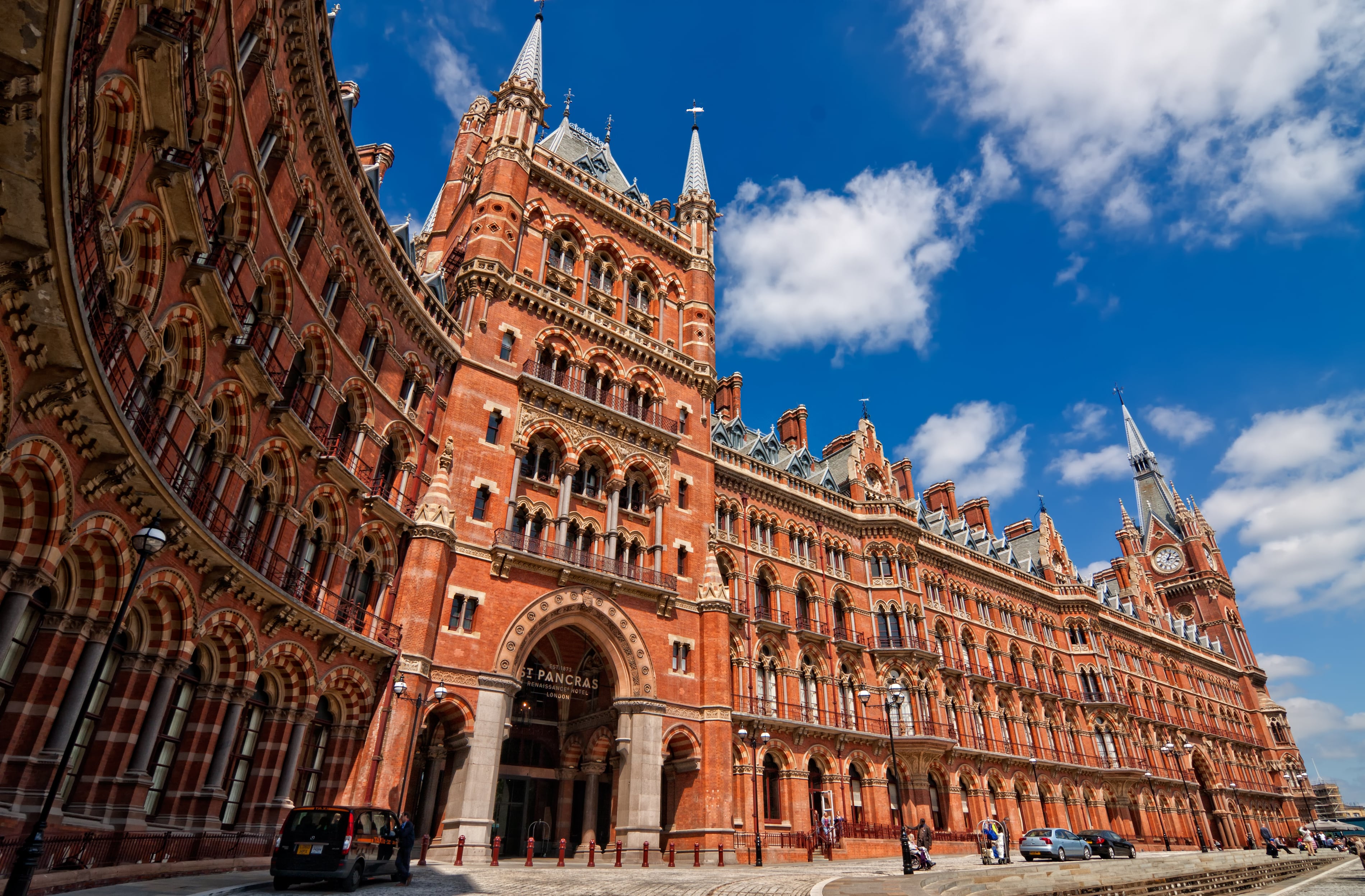The red stone facade and entrance way of St. Pancras station.