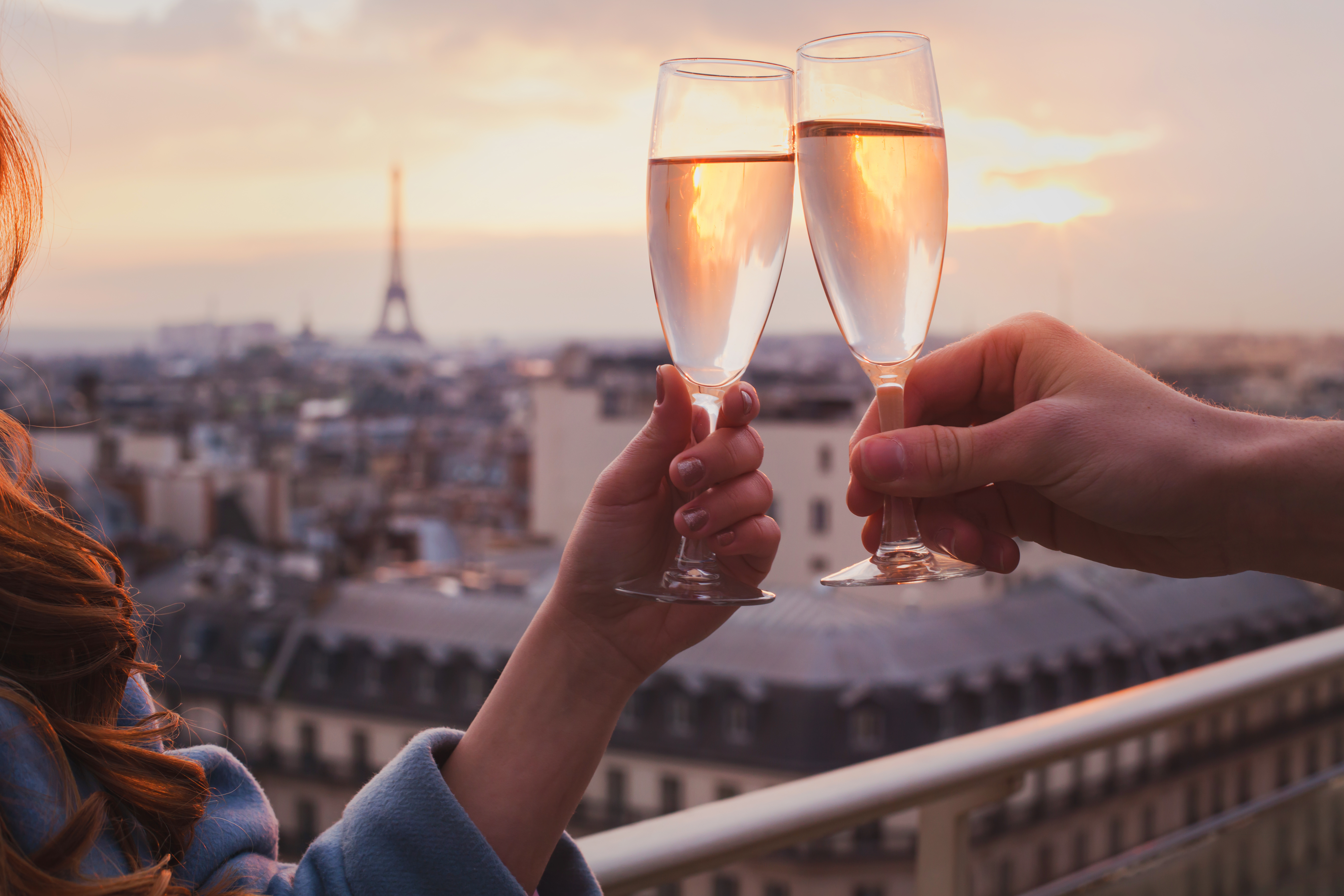 Couple enjoying champagne in Paris, France