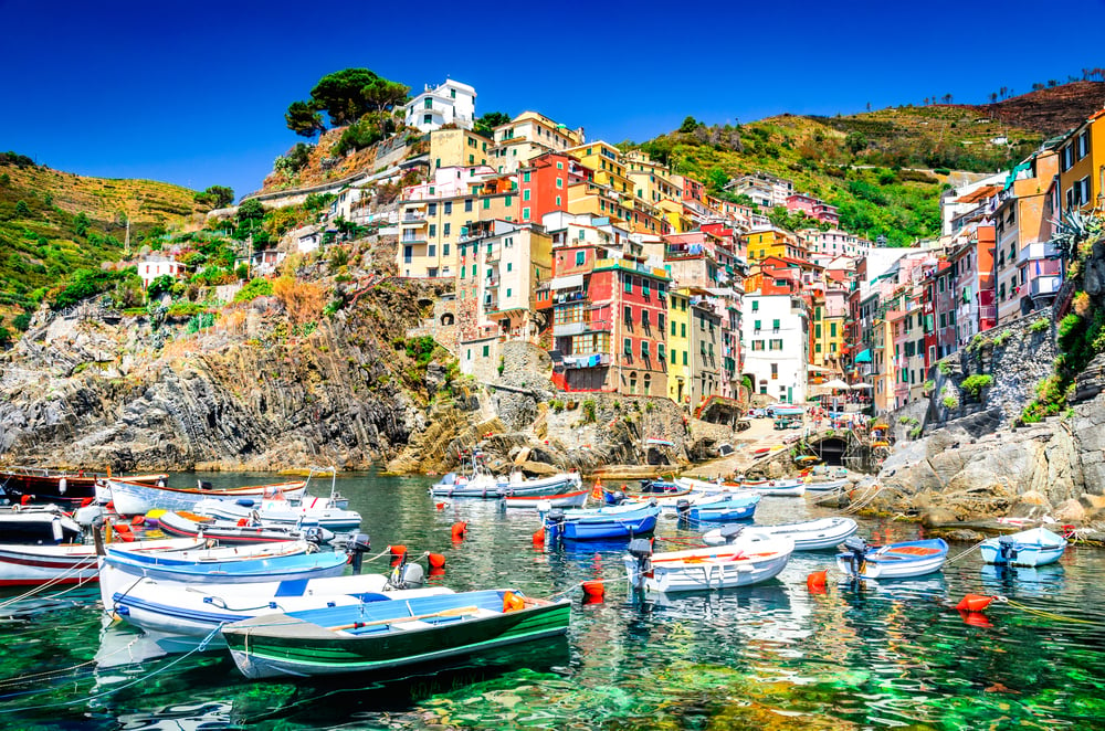 Riomaggiore with boats and ocean