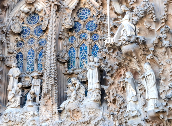 Detail of the facade of sacred family "La Sagrada Familia" , cathedral designed by Gaudi, being built since 19 March 1882 with people donations