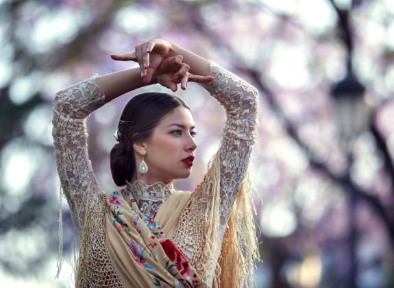 Woman in flamenco dress and headscarf