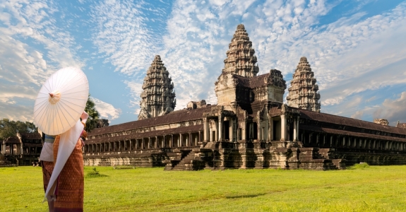Unidentified young couple green traditional ceremonial wedding Khmer clothing at the ancient Angkor Wat temple - Cambodia