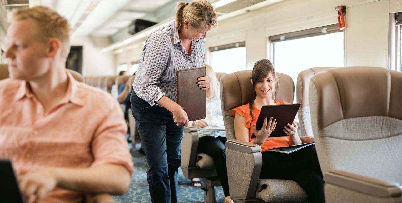 Red Premium Service class seating onboard The Overland train in Australia
