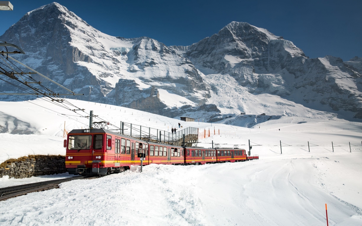 Travelling on the Jungfrau A train travels down from mountain peak