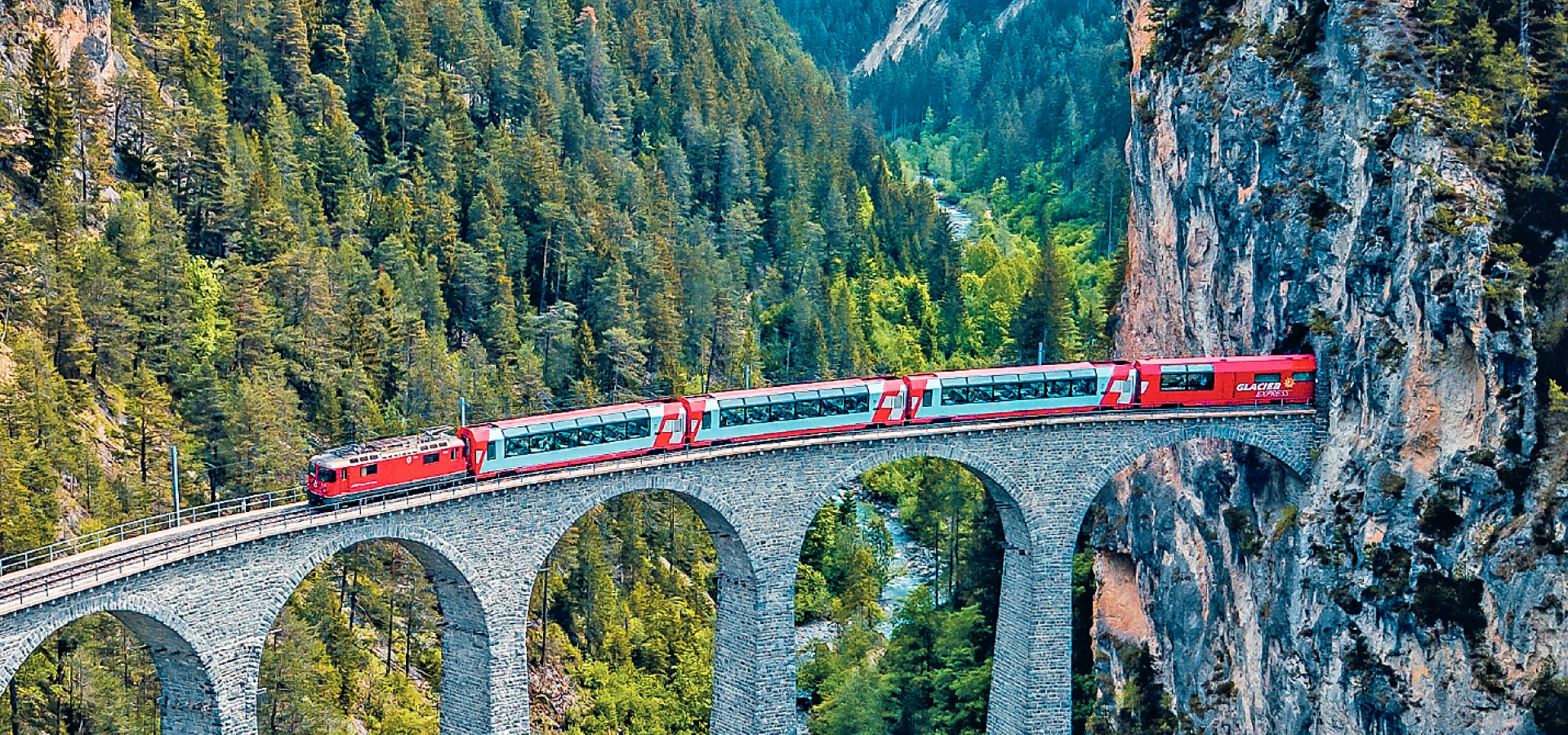 A Train travels over the Landwasser viaduct in Switzerland
