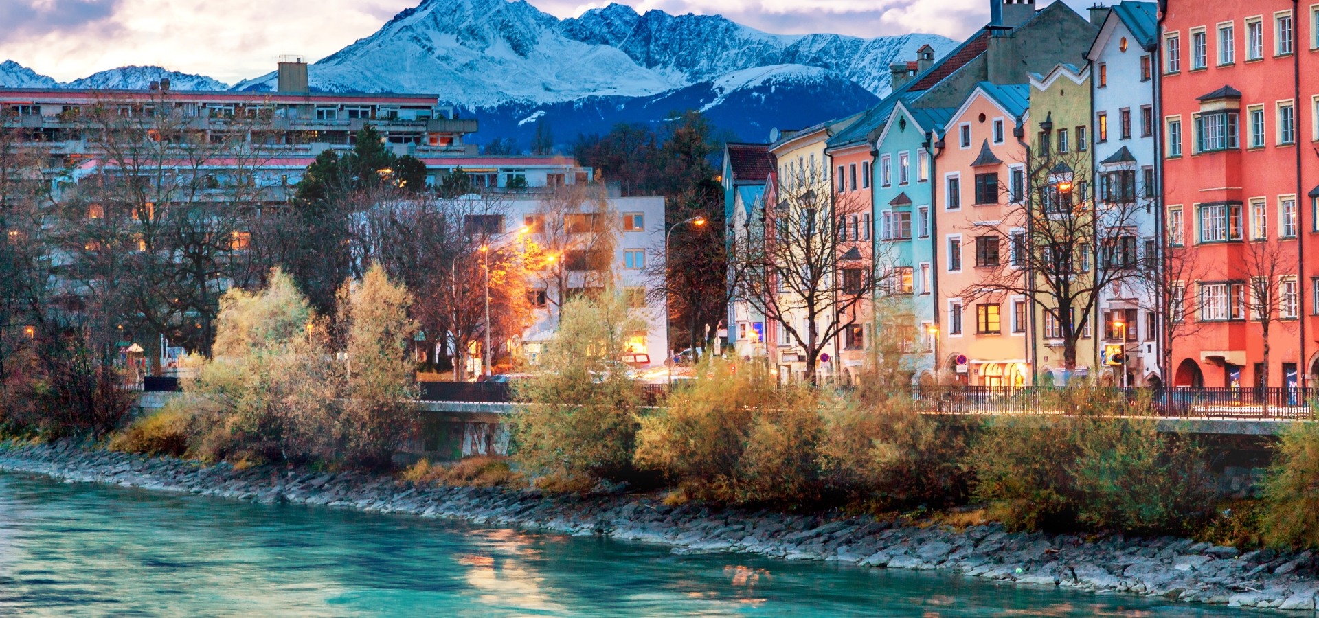 Innsbruck embankment with beauty houses at the Inn river. Innsbruck is the capital city of Tyrol in western Austria.