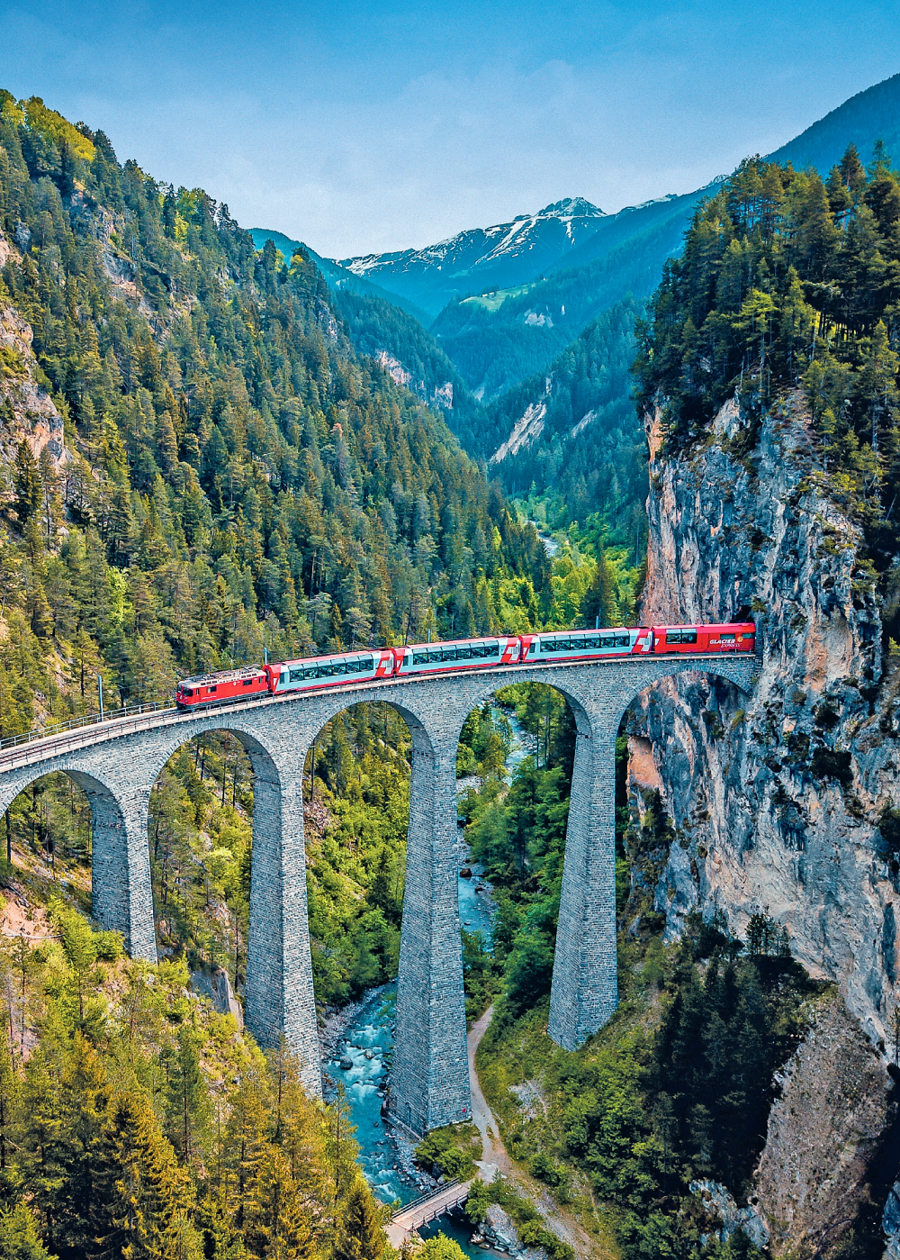 A Train travels over the Landwasser viaduct in Switzerland