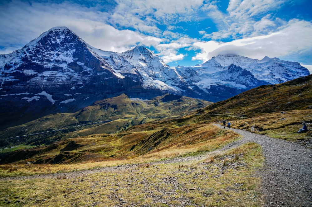 Hiking trail with the Eiger,Monch and Jungfrau summit view.