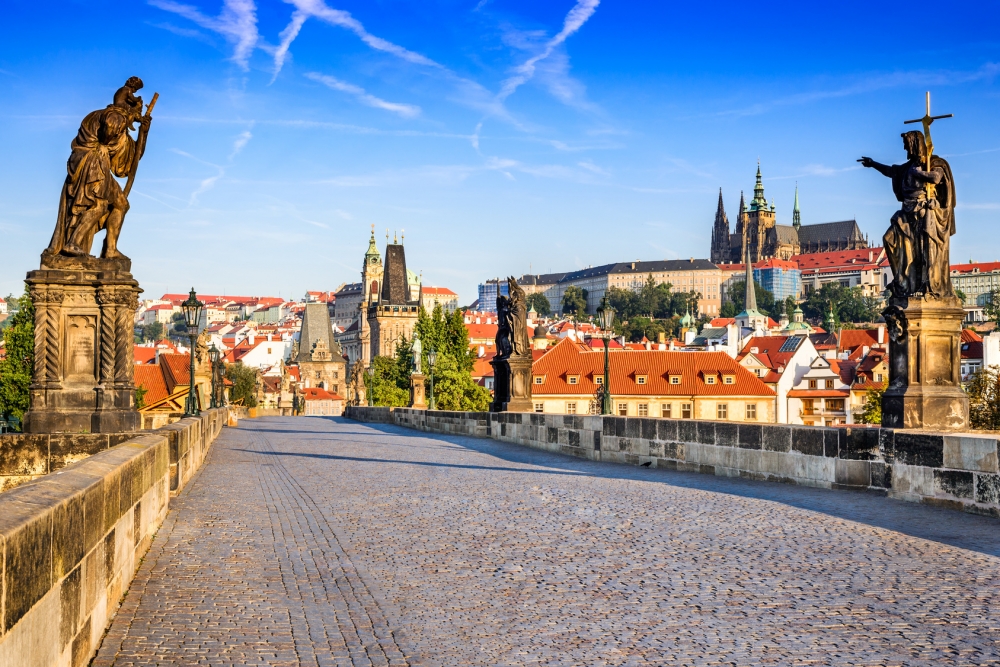 Stroll through the Charles Bridge in Prague on a Czech Republic rail vacation by Railbookers