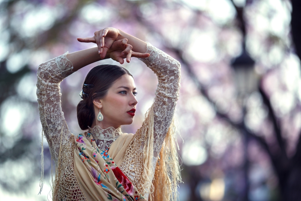 Woman in flamenco dress and headscarf