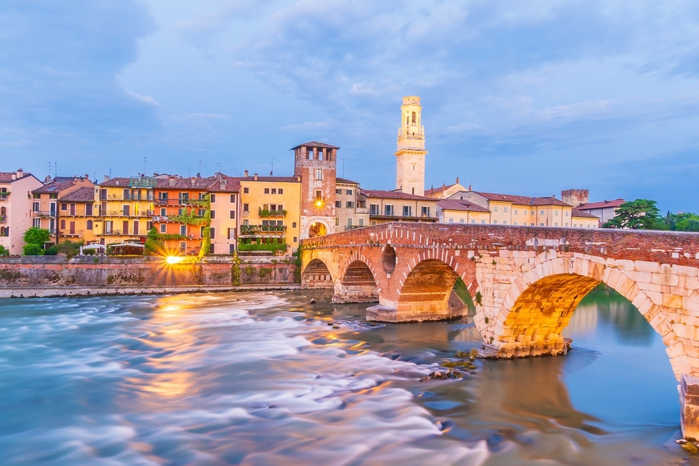 Verona city downtown skyline, cityscape of Italy at sunset